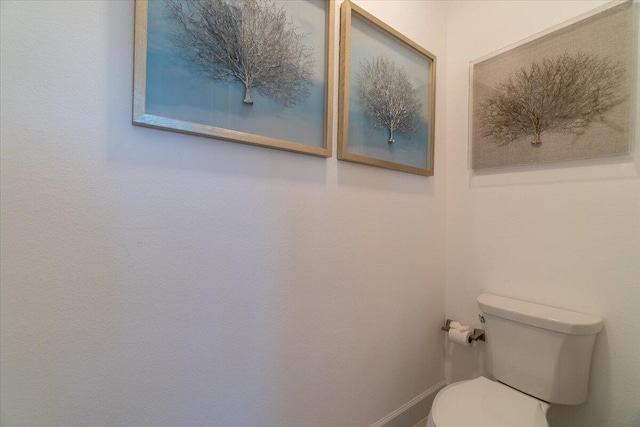 bathroom featuring toilet