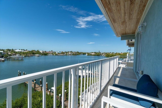 balcony featuring a water view