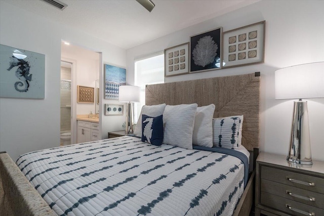 bedroom with connected bathroom