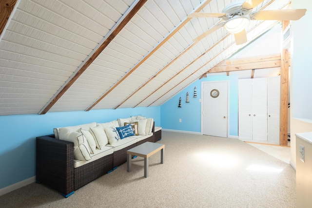 living area with lofted ceiling, carpet, baseboards, visible vents, and ceiling fan