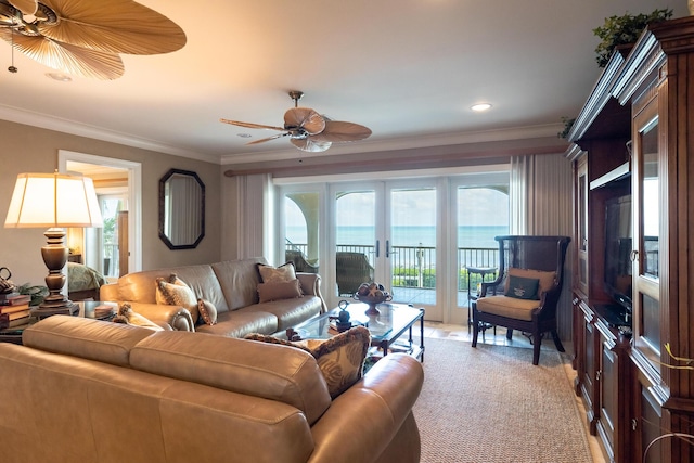 living area featuring recessed lighting, ornamental molding, a ceiling fan, and french doors