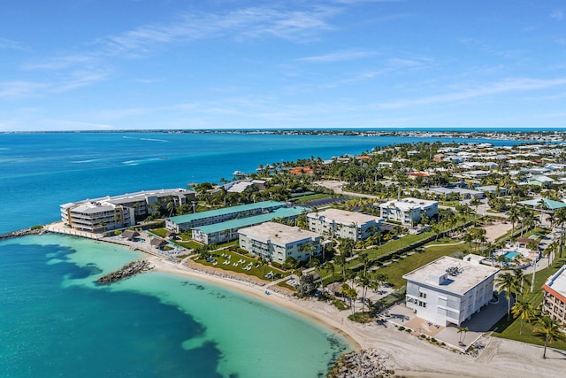 bird's eye view with a view of the beach and a water view