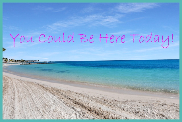 1101 Ocean Dr Unit 19, Key Colony, FL 33051 - property view of water with a beach view