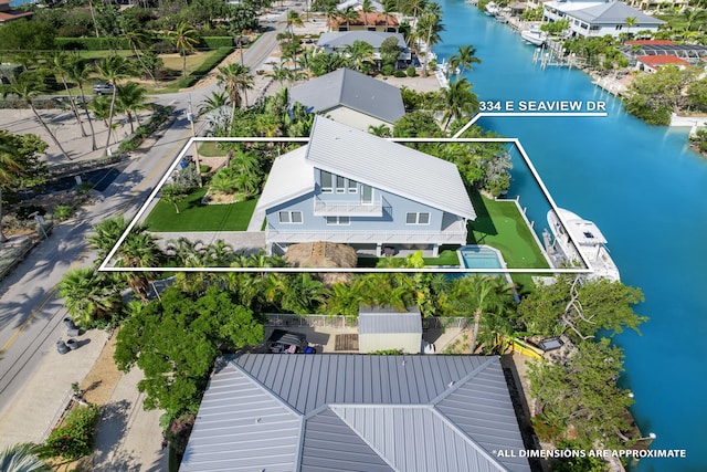 bird's eye view with a water view