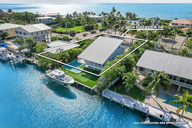 aerial view featuring a water view