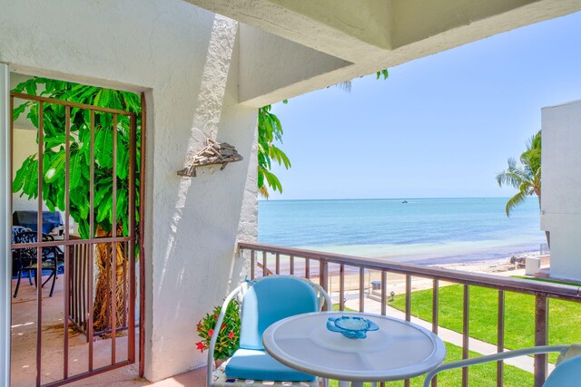601 Ocean Dr Unit 414D, Key Colony, FL 33051 - balcony featuring view of water and beach