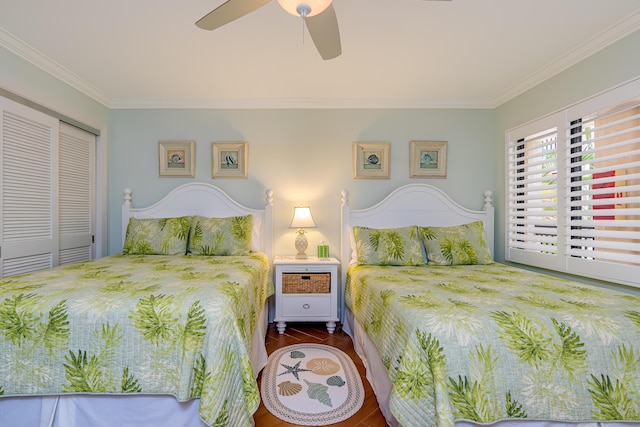 bedroom featuring crown molding, a closet, and a ceiling fan