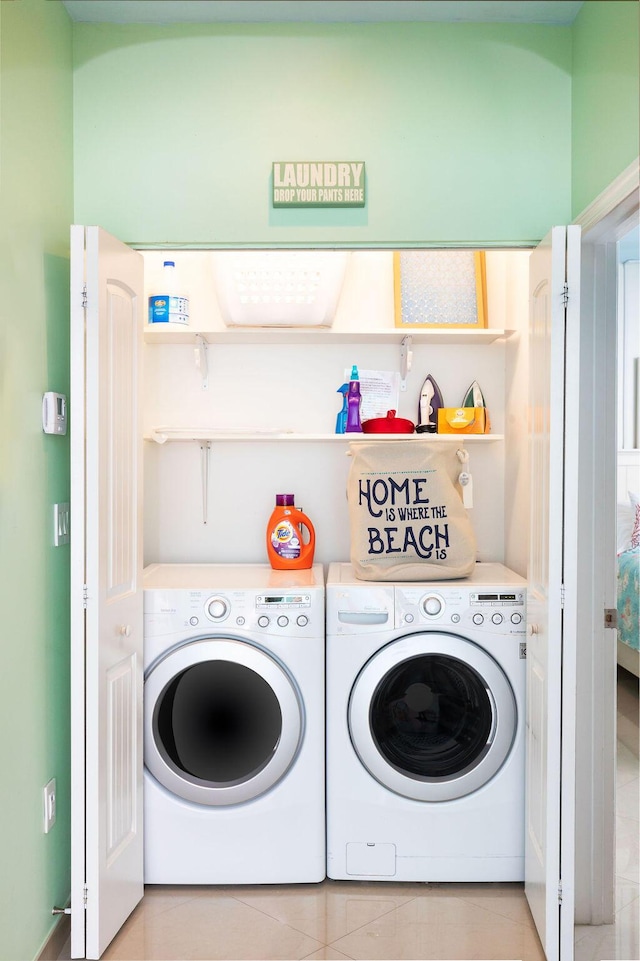 washroom with laundry area and separate washer and dryer