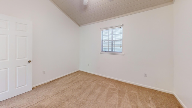 29720 Journeys End Rd, Big Pine, FL 33043 - unfurnished room with light colored carpet, vaulted ceiling, baseboards, and wood ceiling
