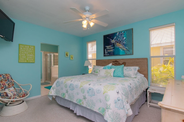 461 3rd St, Key Colony, FL 33051 - bedroom featuring carpet, baseboards, ceiling fan, and ensuite bath