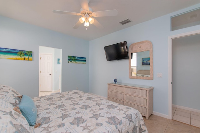 461 3rd St, Key Colony, FL 33051 - bedroom featuring light tile patterned floors, ceiling fan, and baseboards