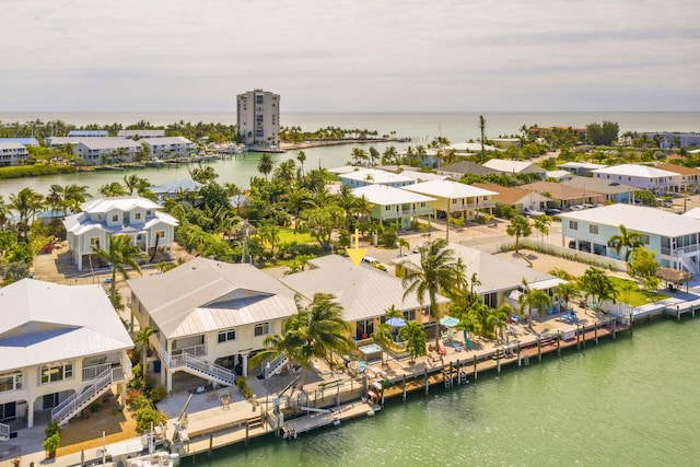 461 3rd St, Key Colony, FL 33051 - aerial view of residential area with a large body of water