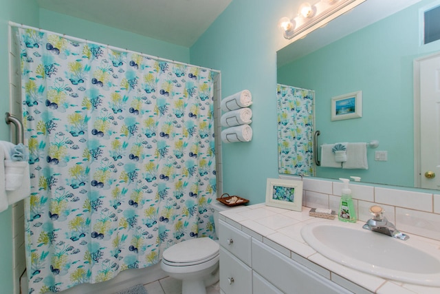 461 3rd St, Key Colony, FL 33051 - full bath with vanity, toilet, tile patterned floors, and a shower with shower curtain