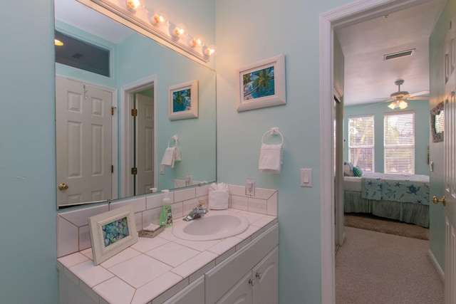 461 3rd St, Key Colony, FL 33051 - bathroom featuring vanity, ensuite bathroom, and a ceiling fan