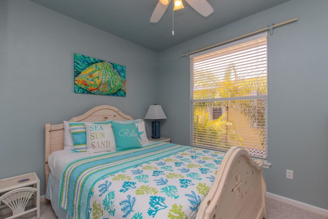 461 3rd St, Key Colony, FL 33051 - bedroom with carpet flooring, baseboards, and a ceiling fan
