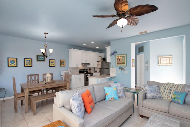 461 3rd St, Key Colony, FL 33051 - living area featuring a chandelier, ceiling fan, light tile patterned floors, baseboards, and recessed lighting