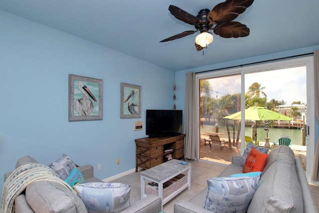 461 3rd St, Key Colony, FL 33051 - tiled living room with a ceiling fan and baseboards