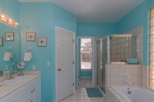 461 3rd St, Key Colony, FL 33051 - bathroom featuring a stall shower, a tub with jets, vanity, tile patterned floors, and baseboards
