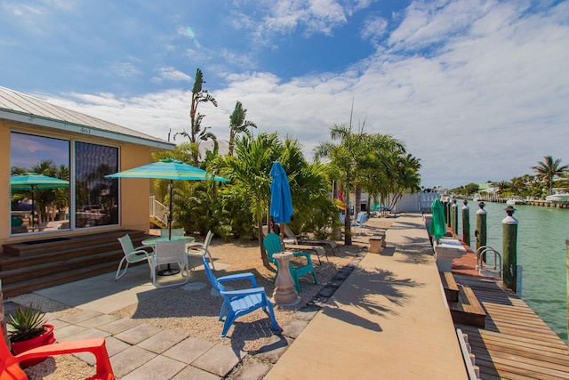 461 3rd St, Key Colony, FL 33051 - view of patio / terrace featuring a dock