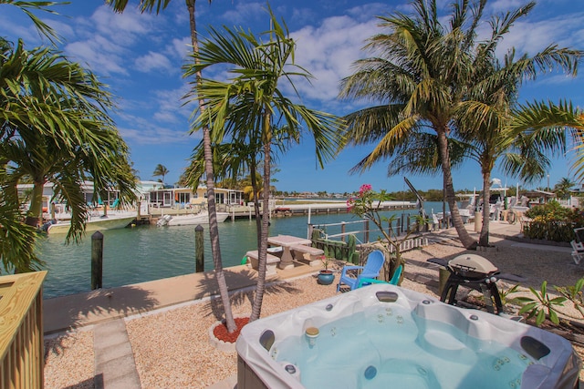461 3rd St, Key Colony, FL 33051 - exterior space with a water view, a dock, and a hot tub