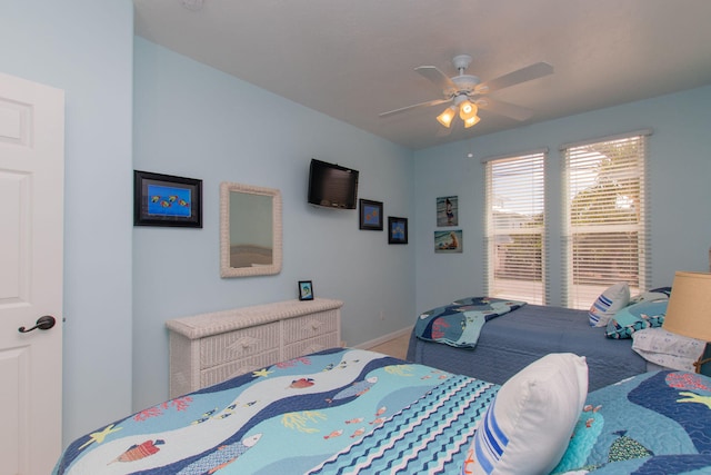 461 3rd St, Key Colony, FL 33051 - bedroom featuring carpet floors, baseboards, and a ceiling fan