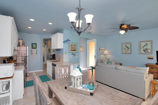 461 3rd St, Key Colony, FL 33051 - dining room featuring a ceiling fan, recessed lighting, light tile patterned floors, a chandelier, and baseboards