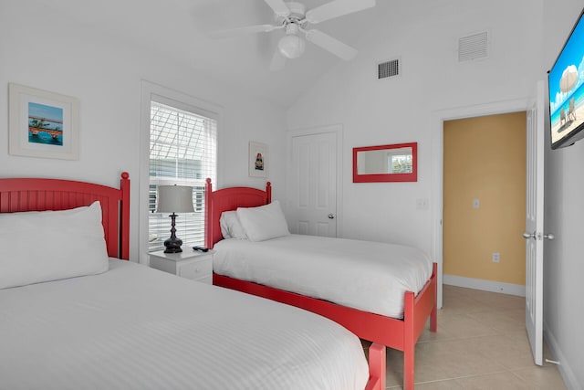 bedroom with lofted ceiling, visible vents, a ceiling fan, and light tile patterned flooring