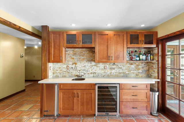 1613 Bahama Dr, Key West, FL 33040 - indoor wet bar featuring wine cooler, decorative backsplash, recessed lighting, and baseboards