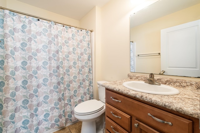 bathroom featuring tile patterned floors, toilet, a shower with shower curtain, and vanity