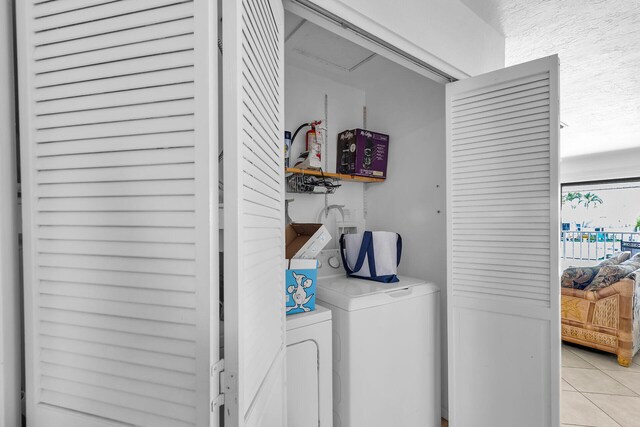 5019THST & St, Key Colony, FL 33051 - laundry room featuring washer and clothes dryer and light tile patterned floors