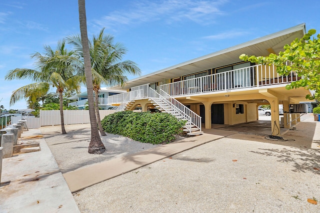 5019THST & St, Key Colony, FL 33051 - view of building exterior featuring a carport and stairs