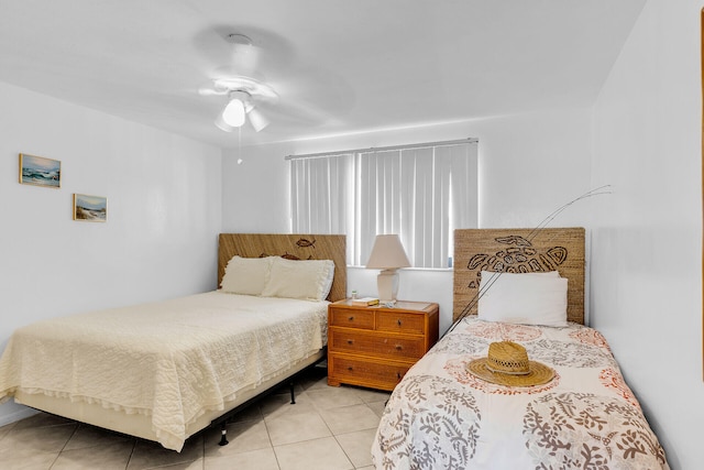 5019THST & St, Key Colony, FL 33051 - bedroom with light tile patterned floors and ceiling fan