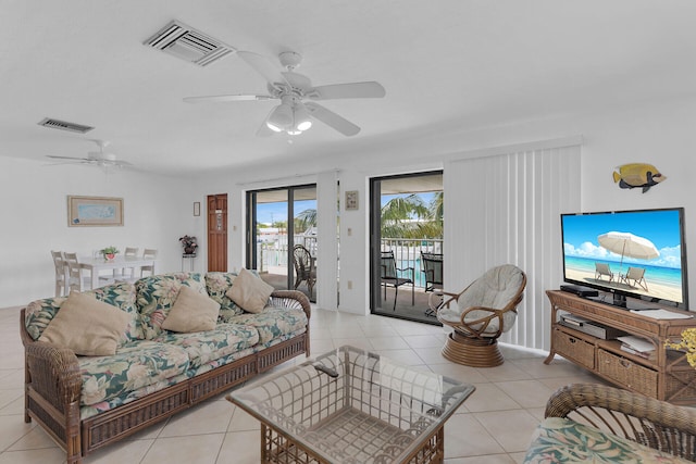 5019THST & St, Key Colony, FL 33051 - living room with ceiling fan and light tile patterned flooring