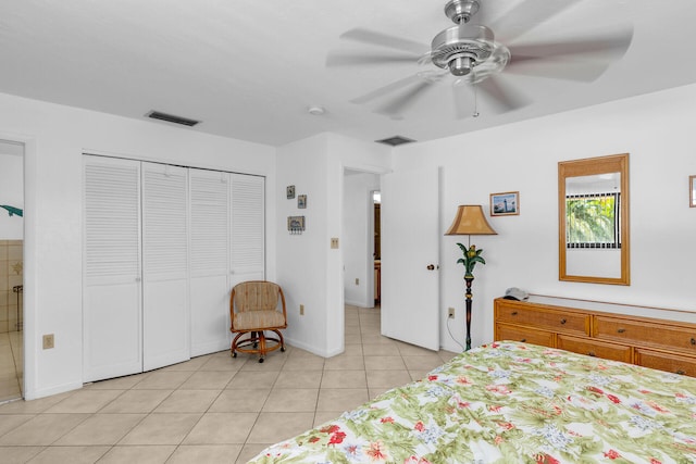 5019THST & St, Key Colony, FL 33051 - bedroom with light tile patterned flooring, a closet, ceiling fan, and baseboards
