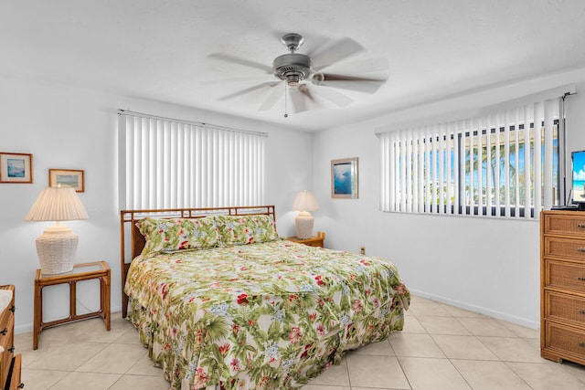 5019THST & St, Key Colony, FL 33051 - bedroom featuring light tile patterned floors, baseboards, and a ceiling fan