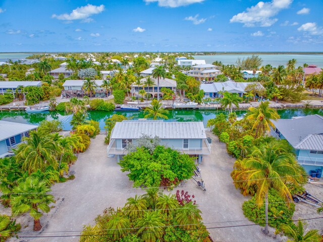 17126 Wahoo Ln, Sugarloaf, FL 33042 - aerial perspective of suburban area with a nearby body of water