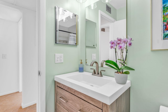 17126 Wahoo Ln, Sugarloaf, FL 33042 - bathroom with tile patterned flooring, vanity, and baseboards