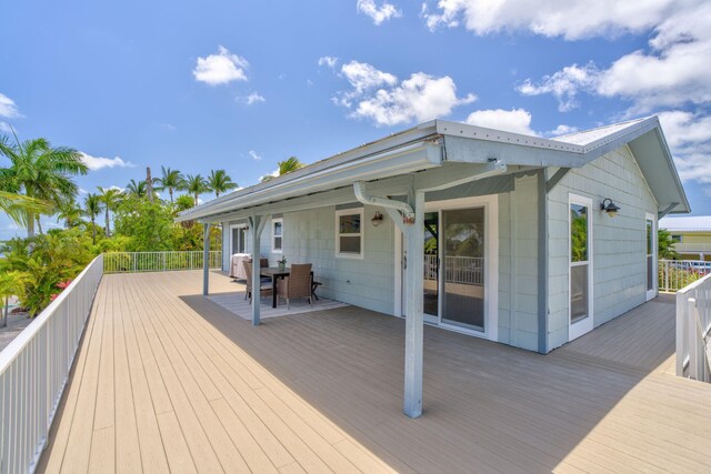 17126 Wahoo Ln, Sugarloaf, FL 33042 - deck with outdoor dining area