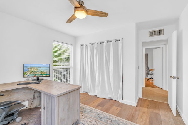 17126 Wahoo Ln, Sugarloaf, FL 33042 - office with ceiling fan, light wood-style floors, and baseboards