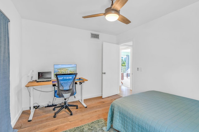 17126 Wahoo Ln, Sugarloaf, FL 33042 - bedroom featuring wood finished floors, ceiling fan, and baseboards