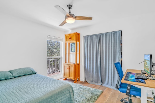17126 Wahoo Ln, Sugarloaf, FL 33042 - bedroom with light wood finished floors, ceiling fan, and an office area