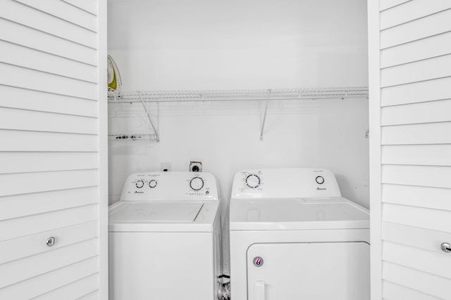laundry area featuring laundry area and washing machine and clothes dryer