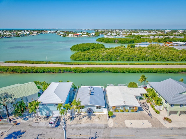 bird's eye view featuring a residential view and a water view