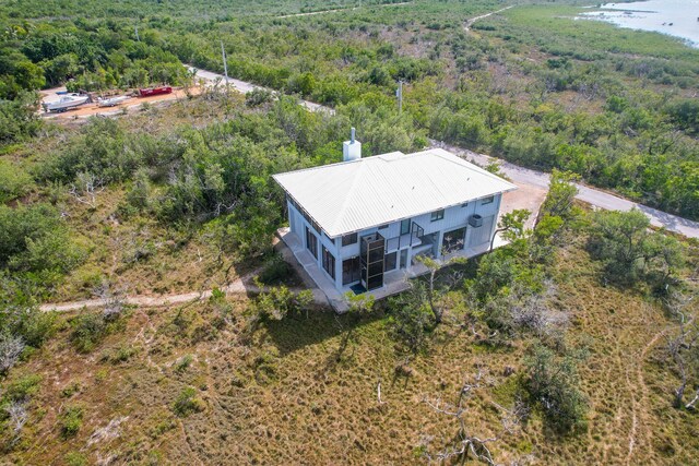 aerial view featuring a forest view