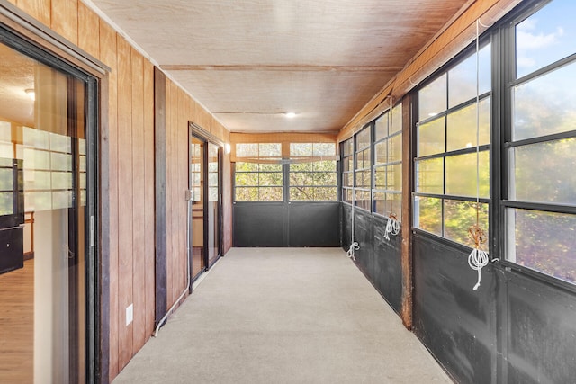 sunroom / solarium featuring a healthy amount of sunlight