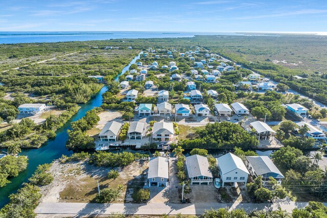 aerial view featuring a residential view and a water view