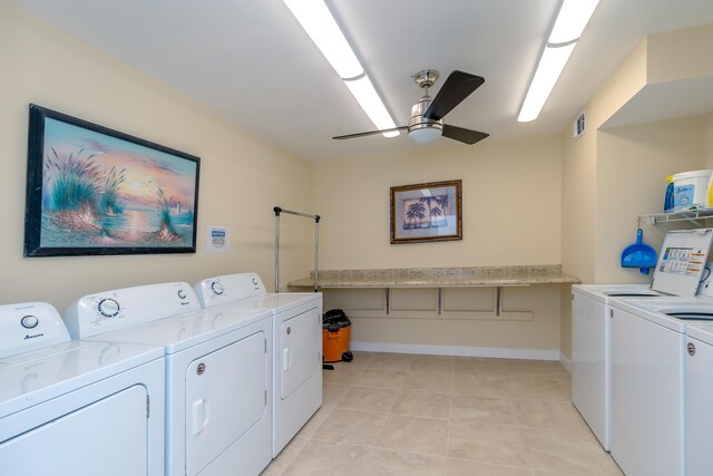 common laundry area featuring ceiling fan, light tile patterned floors, visible vents, baseboards, and independent washer and dryer