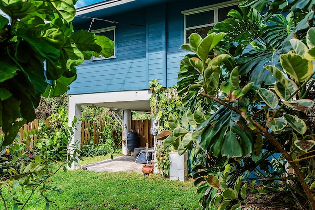 exterior space featuring fence and a patio