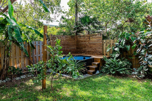 view of yard featuring a fenced backyard