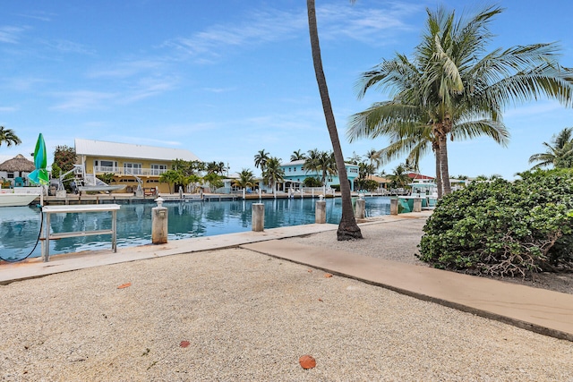 501 9th St, Key Colony, FL 33051 - view of pool featuring a dock and a water view
